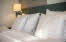 Copyright: Rebecca Watson Pillows in bed